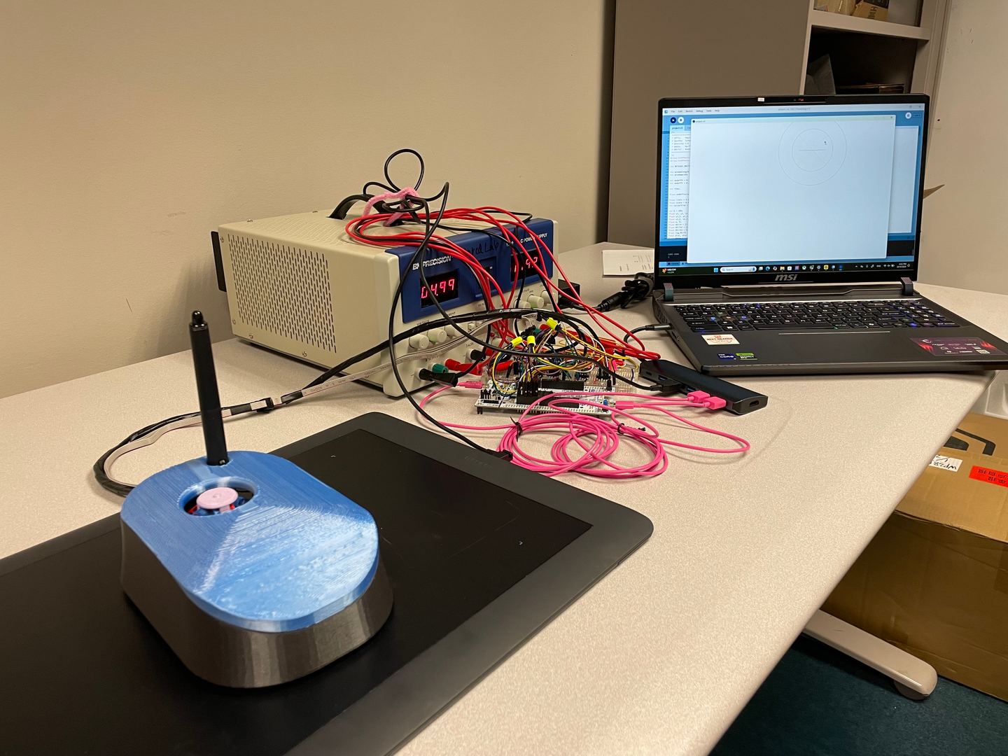 Lab equipment and hands interacting with soft materials